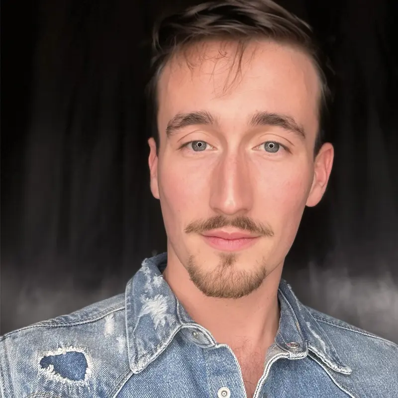 HEADSHOT_NATHAN.webp