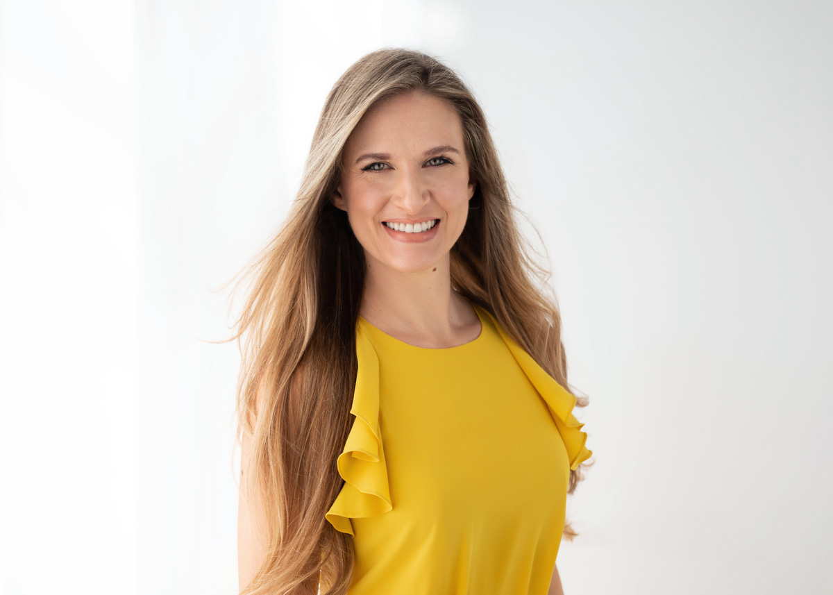 Lara McGill smile yellow.jpg